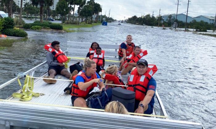 Coast Guard Saves 9 People, 1 Dog Stranded During Hurricane Sally Flashflood