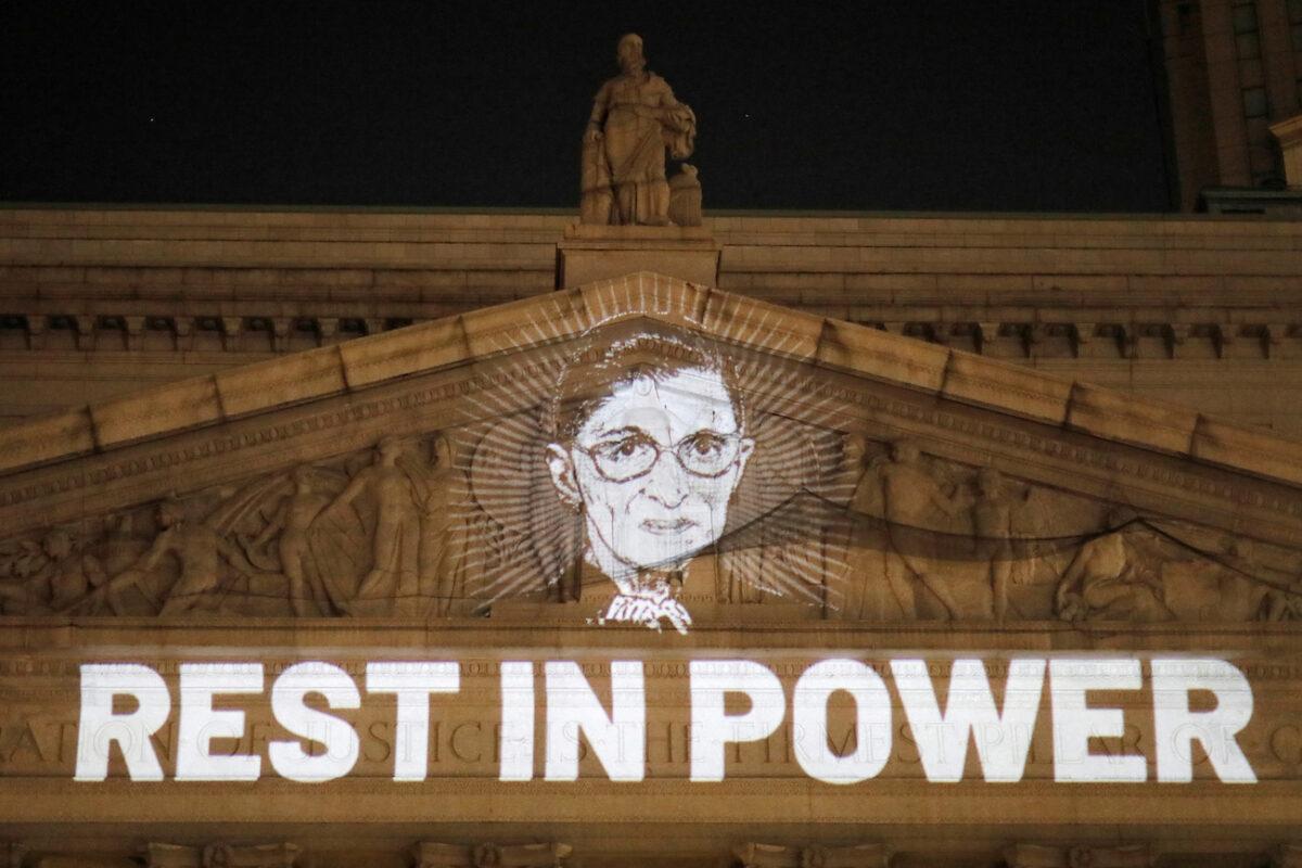 An image of late Supreme Court Justice Ruth Bader Ginsburg is projected onto the New York State Civil Supreme Court in Manhattan, N.Y., on Sept. 18, 2020. (Andrew Kelly/Reuters)