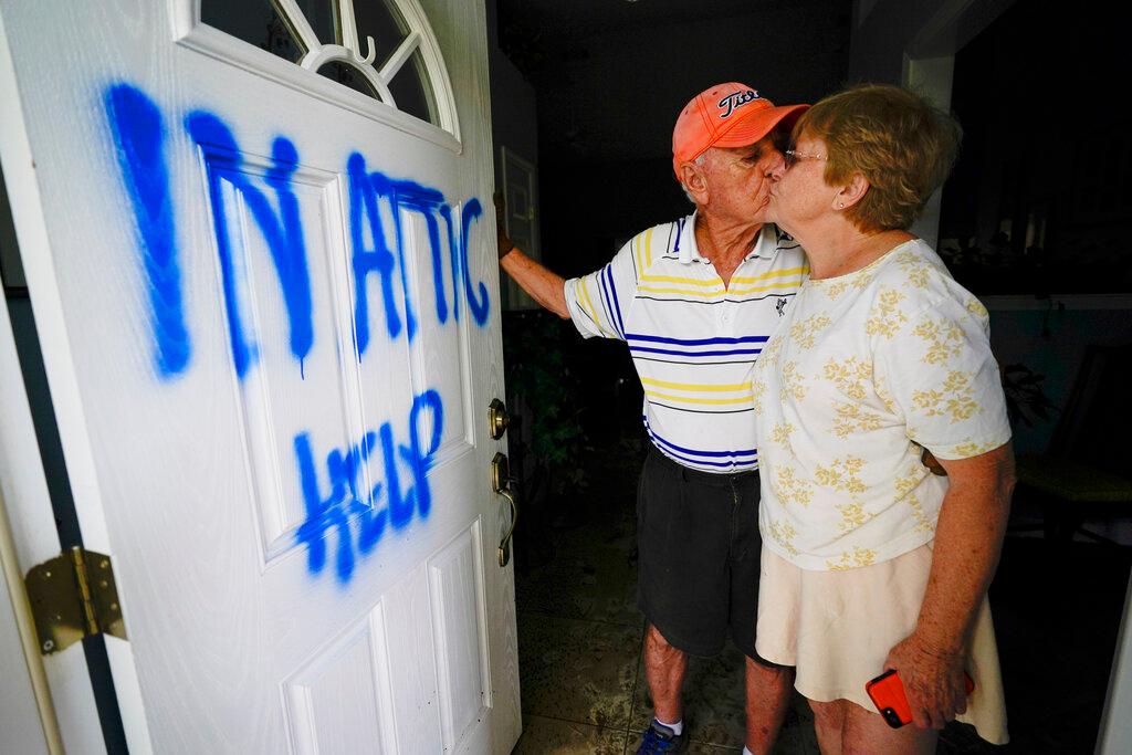 Elaine and Jack Hulgan after riding out the hurricane in their attic, Thursday, Sept. 17, 2020, in Cantonment, Fla. (Gerald Herbert/AP Photo)