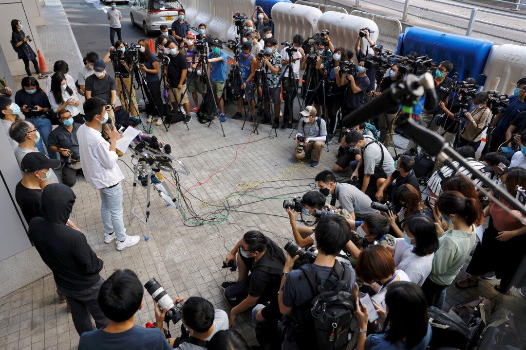 Relatives of 12 Hong Kong People Arrested by China Demand Access for Own Lawyers