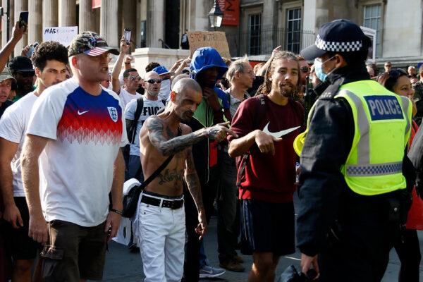 People gather in Trafalgar Square to protest against the lockdown imposed by the government, in London, on Sept. 19, 2020. (Henry Nicholls/Reuters)