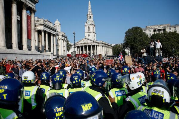 People gather in Trafalgar Square to protest against the lockdown imposed by the government, in London, on Sept. 19, 2020. (Henry Nicholls/Reuters)