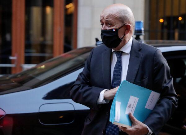 French Foreign Affairs Minister Jean-Yves Le Drian arrives at the Residence Palace ahead of an informal breakfast with EU foreign ministers and Belarusian opposition leader Sviatlana Tsikhanouskaya in Brussels, on Sept. 21, 2020. (Stephanie Lecocq/Reuters)