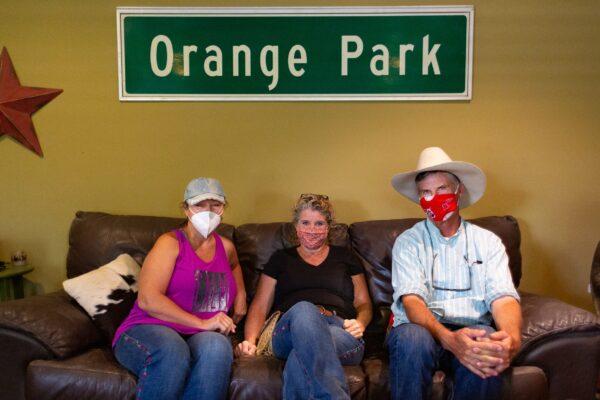 Members of the Orange Park Association (L to R) Laurel Maldonado, Sherry Hart-Panttaja, and David Hillman, sit in Hart-Panttaja's home in Orange, Calif., on Sept. 10, 2020. (John Fredricks/The Epoch Times)