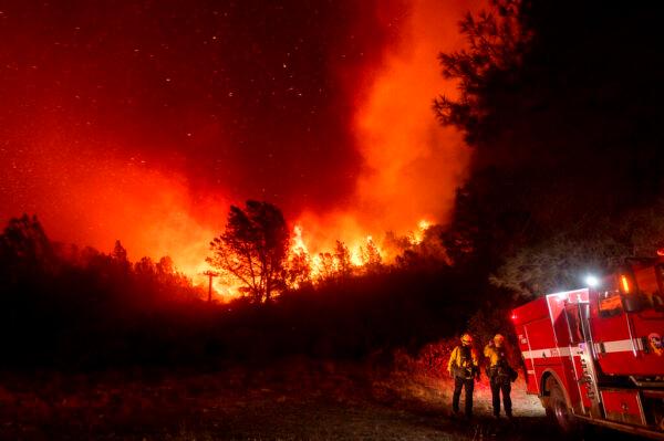 Firefighters watch the Bear Fire approach in Oroville, Calif., on Sept. 9, 2020. (Noah Berger/AP Photo)