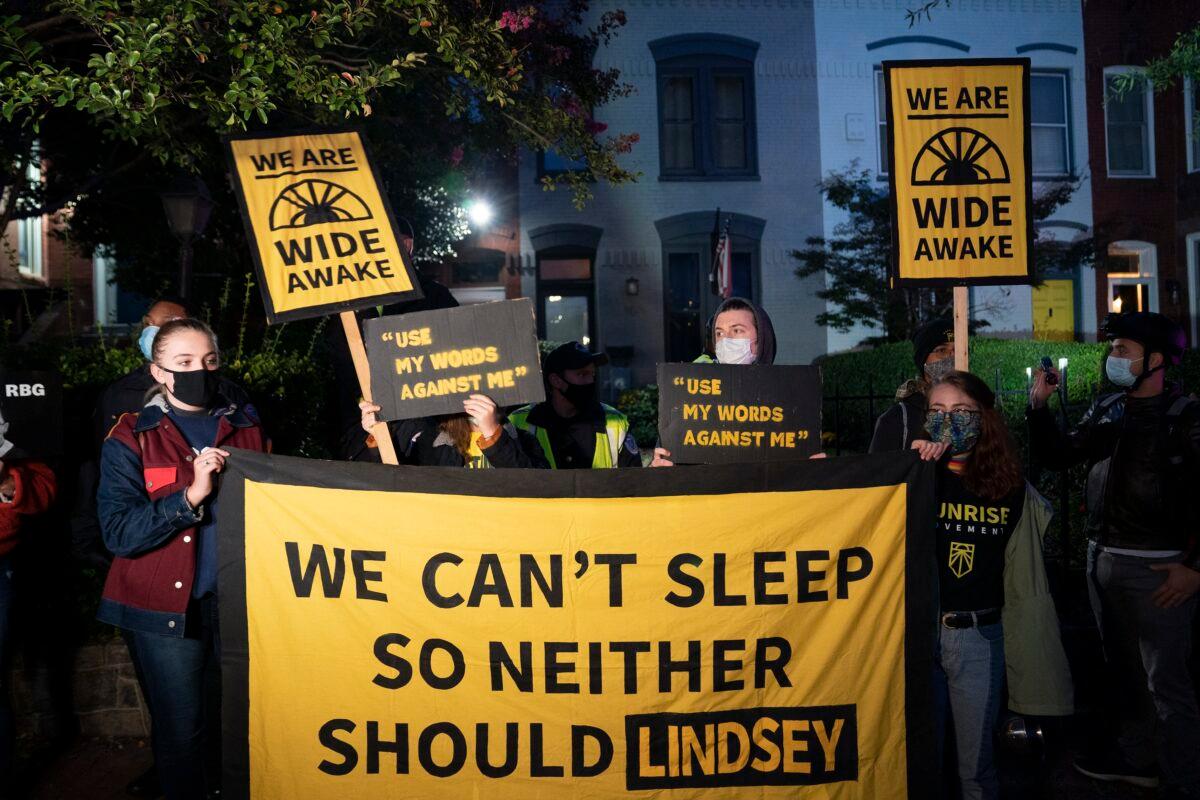 Demonstrators gather outside the home of Sen. Lindsey Graham (R-S.C.) in Washington on Sept. 21, 2020. (Alex Edelman/AFP via Getty Images)