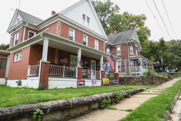 A house displaying pro-Trump political signage in Ridgway, Elk County, Penn., on Sept. 17, 2020. (Charlotte Cuthbertson/The Epoch Times)