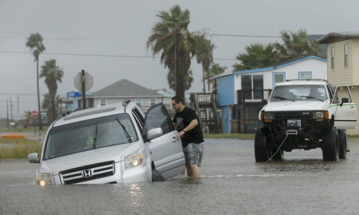 Tropical Storm Beta Stalls Along Texas Coast, Brings Floods