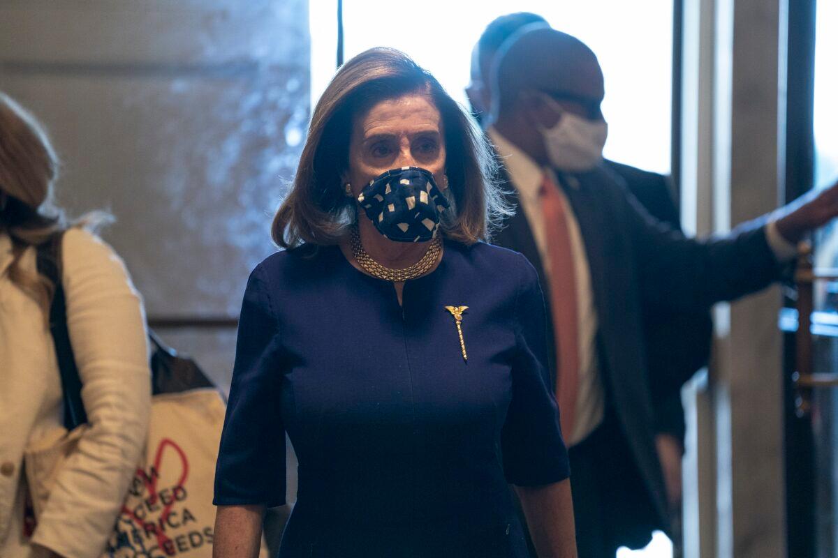 House Speaker Nancy Pelosi (D-Calif.) walks in Washington on Sept. 21, 2020. (Stefani Reynolds/Getty Images)