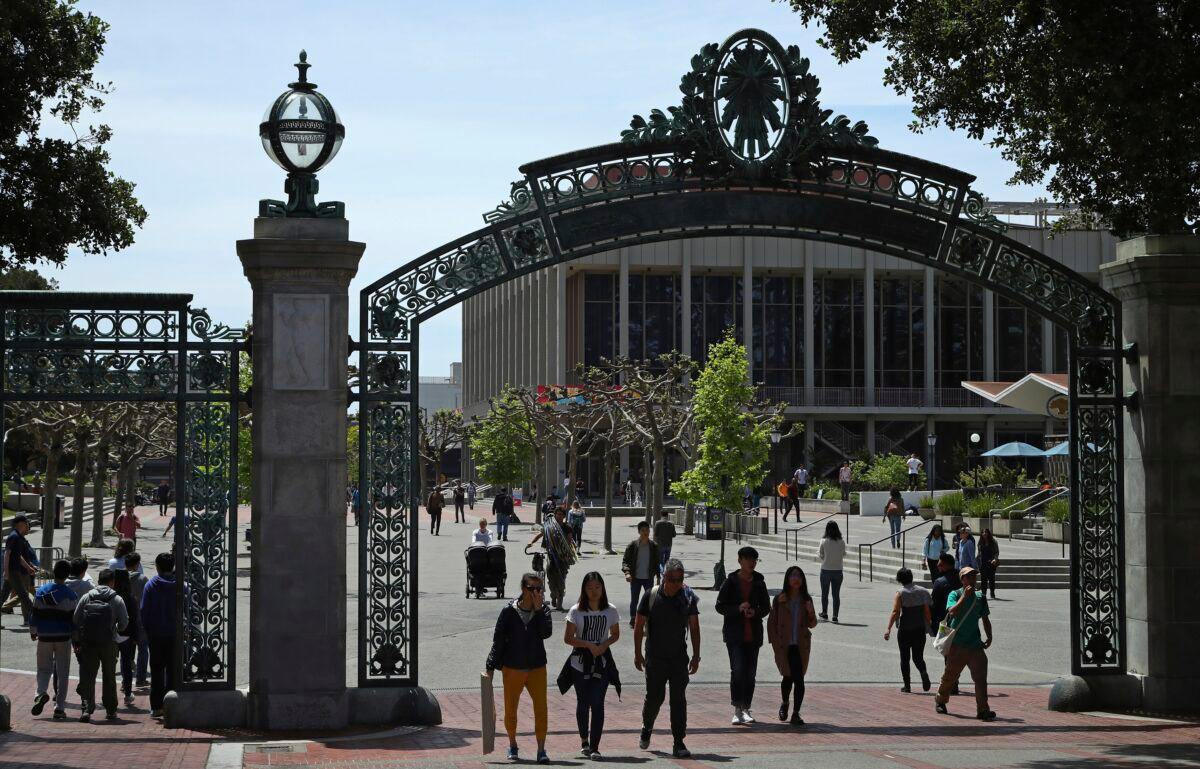 Students walk past Sather Gate on the University of California at Berkeley campus in Berkeley, Calif., May 10, 2018. (Ben Margot/AP Photo)