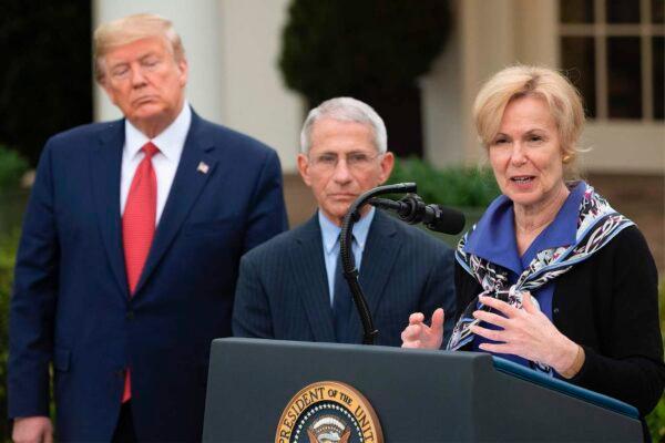 Coronavirus Response Coordinator Dr. Deborah Birx (R) speaks with US President Donald Trump and Director of the National Institute of Allergy and Infectious Diseases Dr. Anthony Fauci during a Coronavirus Task Force press briefing in the Rose Garden of the White House in Washington, on March 29, 2020. (Jim Watson/AFP via Getty Images)