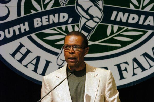 In this June 2, 2004, file photo, Gale Sayers addresses a luncheon sponsored by the College Football Hall of Fall in South Bend, Ind. (Joe Raymond/AP Photo, File)