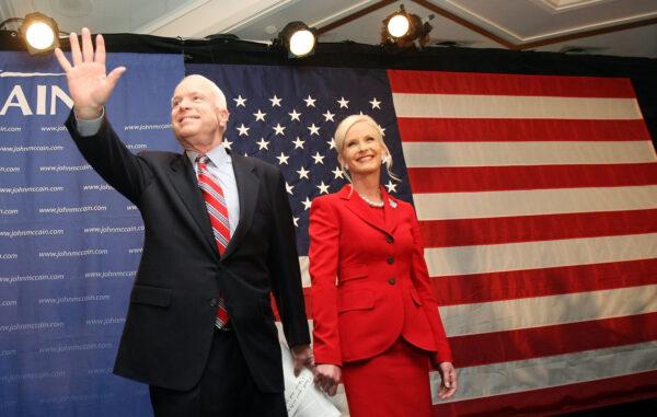 Presidential candidate and Sen. John McCain (R-Ariz.) waves as he stands with his wife Cindy at the Nashua Crowne Plaza in Nashua, N.H., on Jan. 8, 2008 (Mario Tama/Getty Images)