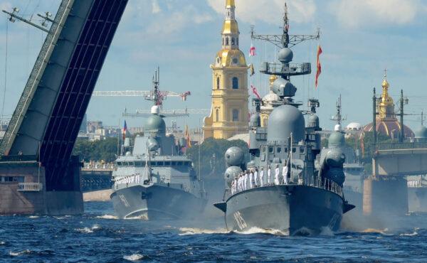 Russian frigates sail on the Neva river during the Navy Day parade in Saint Petersburg on July 26, 2020. (Olga Maltseva/POOL/AFP via Getty Images)