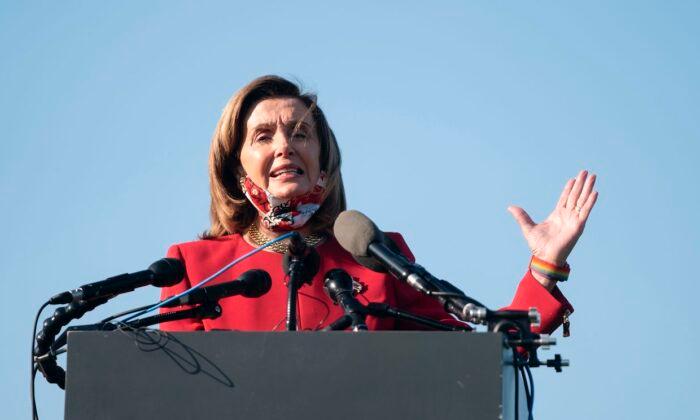 Pelosi to Airlines: Hold off on Furloughs and Firings