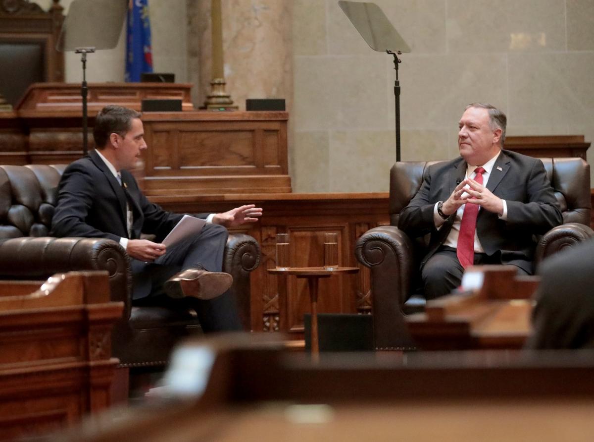 Secretary of State Mike Pompeo, right, listens to a question from Wisconsin Senate President Roger Roth, R-Appleton, during a question-and-answer session with state Republican legislators in the Senate chamber of the Wisconsin State Capitol in Madison, Wis., on Sept. 23, 2020. (John Hart/Wisconsin State Journal via AP)