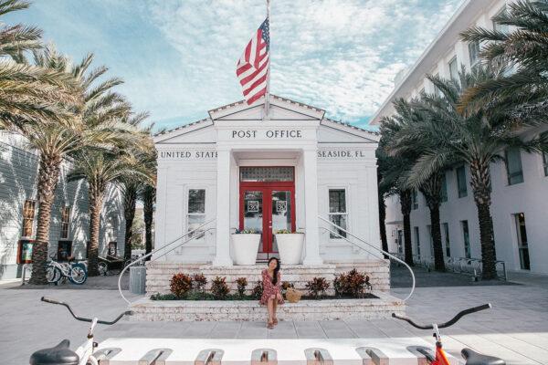 The town of Seaside, Fla., was designed to look and feel like a classic neighborhood, with mixed use development and public spaces that connect neighbors and community. Seen above is the Seaside post office, a pocket park, and a bookstore. (Courtesy of Visit Florida)