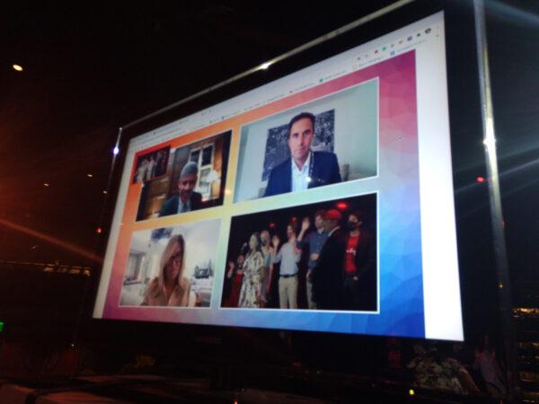 A giant screen shows the judges and competitors of the annual Dragon Kim Foundation's community service competition for high school students at the Webb Theatre in Santa Ana, Calif., on Sept. 15, 2020. (Courtesy of the Dragon Kim Foundation)