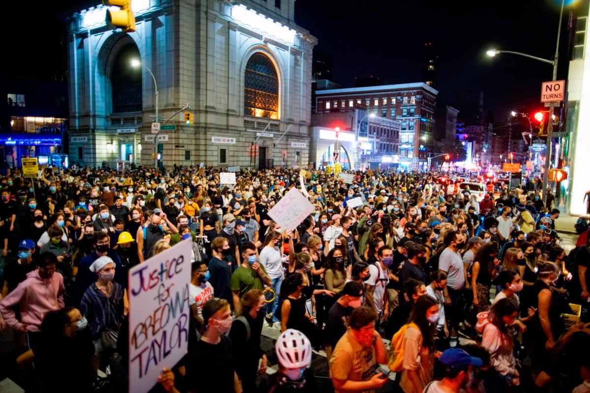 Demonstrators march during a protest in New York City on Sept. 23, 2020. (Eduardo Munoz Alvarez/AP Photo)