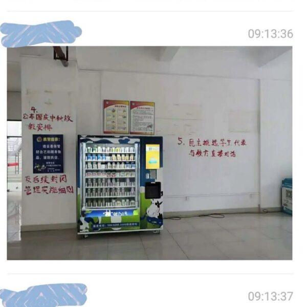 Students write on the wall in protest against the school‘s price hiking during lockdown at Guangdong Medical University's Dongguan Campus in China. (Online Screenshot)