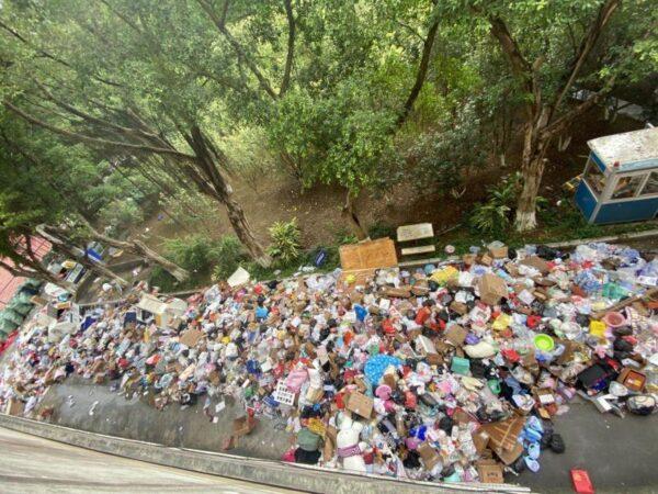 Trash piling up outside the dorms at the Guangzhou Institute of Technology, China. (Supplied)