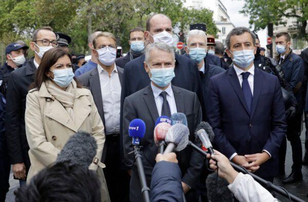 From the left, Paris mayor Anne Hidalgo, anti-terrorism state prosecutor Jean-Francois Ricard, and Interior Minister Gerald Darmanin answer reporters after a knife attack near the former offices of satirical newspaper Charlie Hebdo, in Paris, on Sept. 25, 2020. (Lewis Joly/AP Photo)