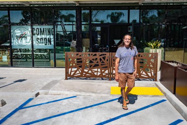 Gene Pietrini, owner of Pietrini Pizza Napoletana, exits the restaurant, still under construction in Los Alamitios, Calif., on September 22, 2020. (John Fredricks/The Epoch Times)