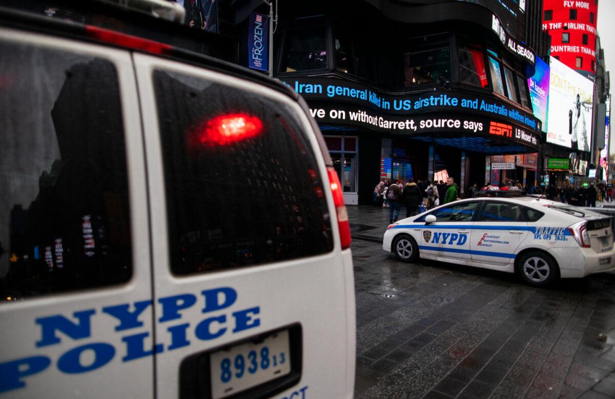 NYPD patrols stand guard at Times Square in New York City, N.Y., on Jan. 3, 2020. (Eduardo Munoz Alvarez/Getty Images)