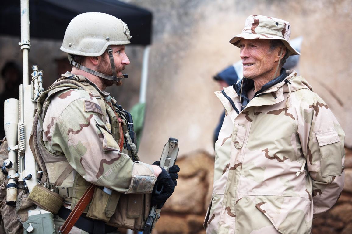 Bradley Cooper (L) and and Clint Eastwood on the set of "American Sniper." (Warner Bros.)