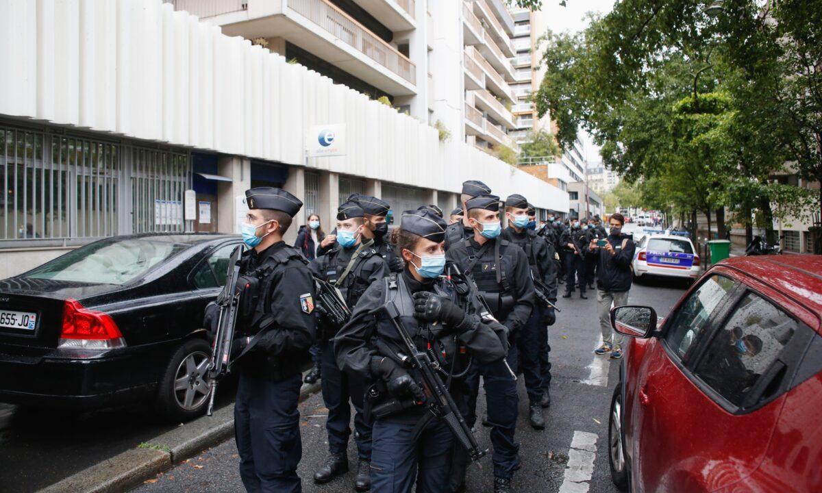French police officers patrol the area after a knife attack near the former offices of satirical newspaper Charlie Hebdo in Paris, on Sept. 25, 2020. (Thibault Camus/AP Photo)