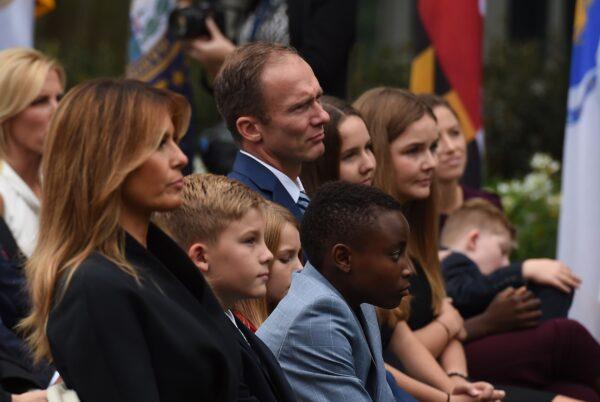 Seventh U.S. Circuit Court Judge Amy Coney Barrett's family and First Lady Melania Trump watch during Barrett's Supreme Court nomination ceremony, at the White House in Washington on Sept. 26, 2020. (Olivier Douliery/AFP via Getty Images)