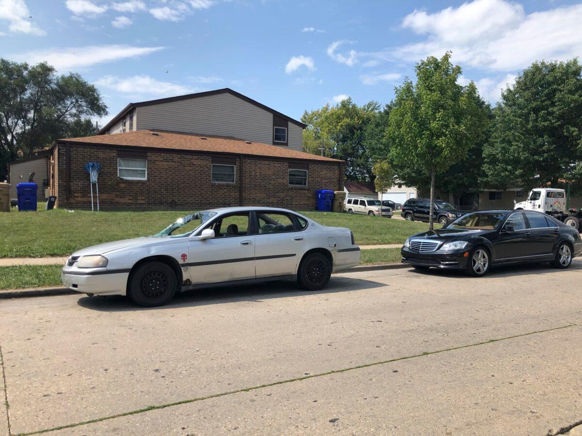 Vehicles are parked on Aug. 28, 2020, in Kenosha, Wis., where Jacob Blake was shot by police after resisting arrest on Aug. 23. (Russell Contreras/AP Photo)