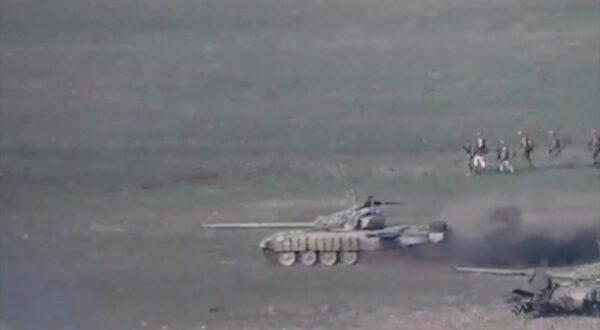 Azerbaijani tanks and service members during clashes in the breakaway region of Nagorno-Karabakh are shown in this still image from footage released by the Armenian Defense Ministry on Sept. 27, 2020. (Defense Ministry of Armenia/Handout via Reuters)