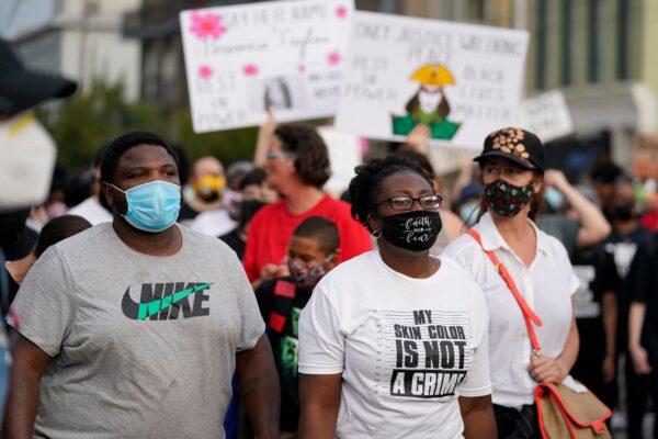 Black Lives Matter protesters march in Louisville, Ky., on Sept. 25, 2020. (Darron Cummings/AP Photo)