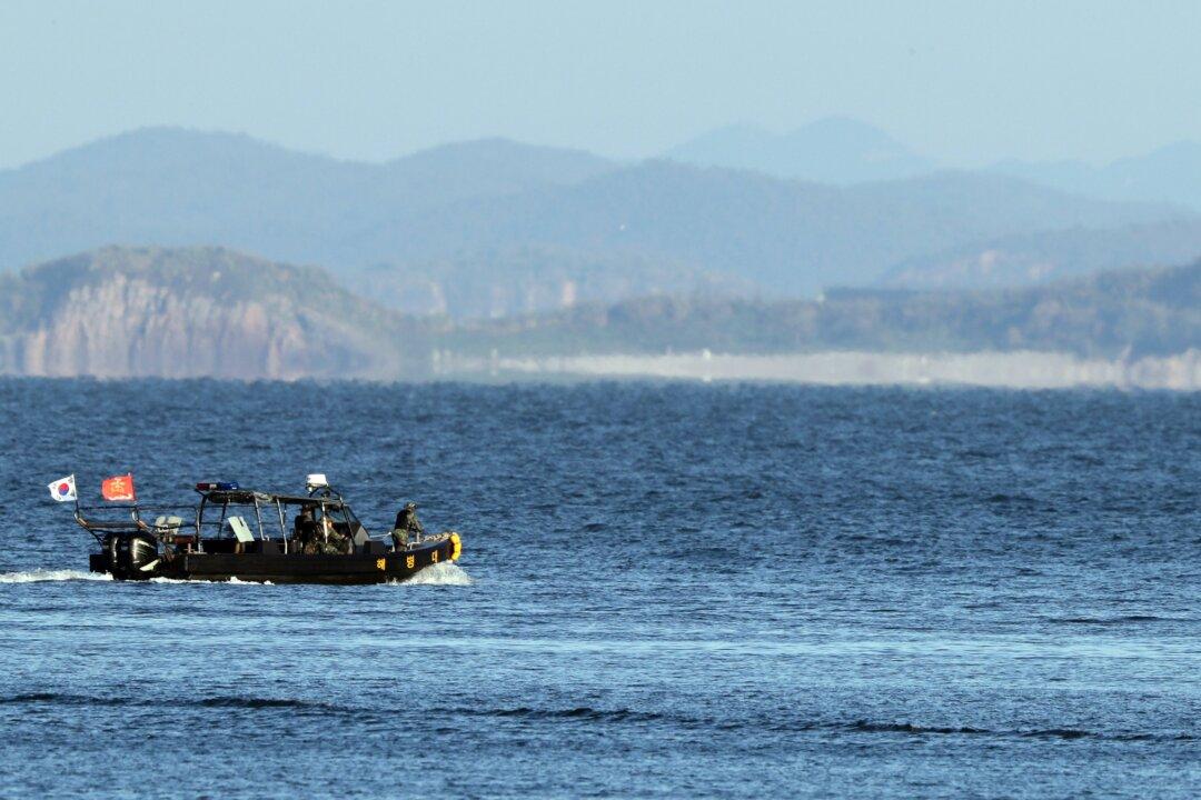 North Korea Accuses South of Intrusion to Find Dead Official