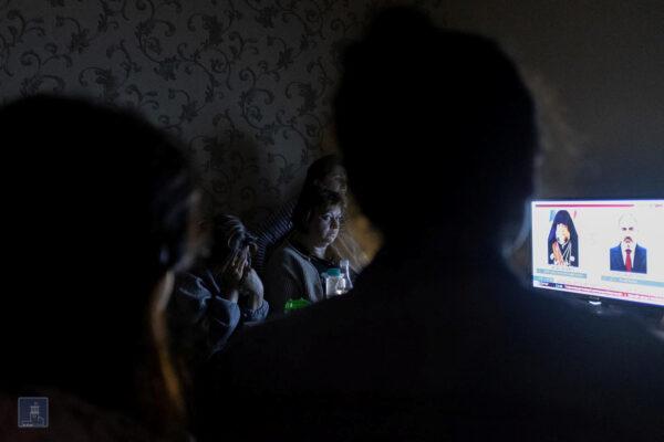 People watch TV in a bomb shelter in Stepanakert, the capital of the breakaway Nagorno-Karabakh region, on Sept. 28, 2020. (Foreign Ministry of Armenia/Handout via Reuters)