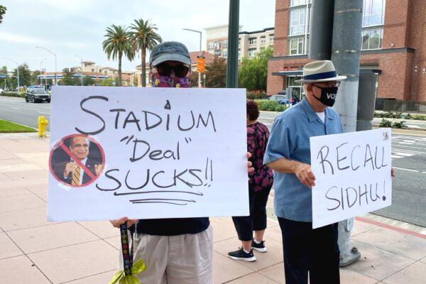 Protesters oppose the deal between the City of Anaheim and SRB Management for the sale of Angel Stadium and the surrounding land, in Anaheim, Calif., on Sept. 21, 2020. (Chris Karr/The Epoch Times)