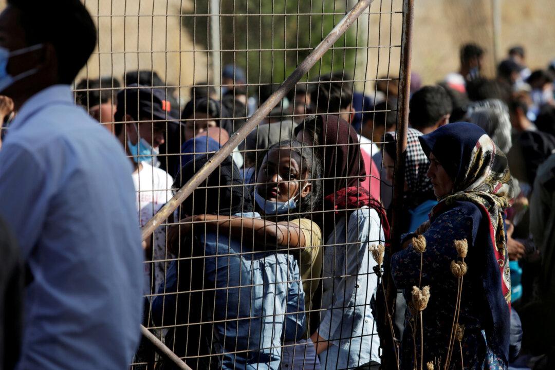 Greek Police Probe Aid Workers Over Links to Human Traffickers