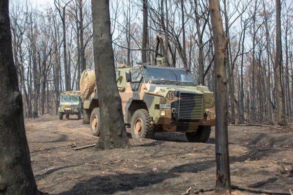  An Australian Army bushmaster assists in conducting a route clearance in the Cobargo, NSW region in support of Operation Bushfire Assist 19-20. (SGT Bill Solomou/ADF)