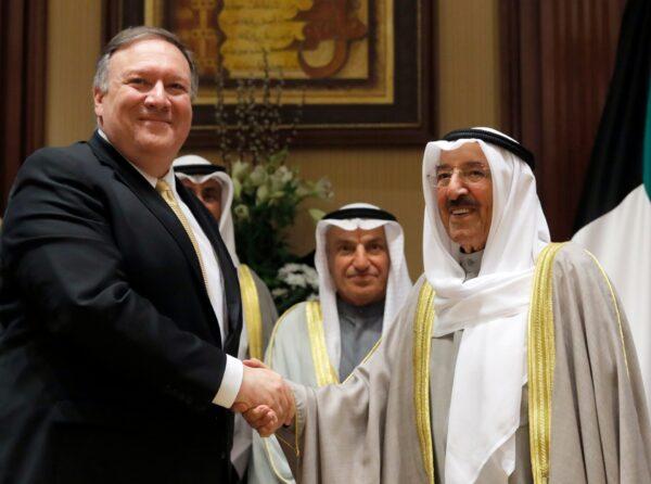  U.S. Secretary of State Mike Pompeo (L) shakes hands with Kuwait's Emir Sheikh Sabah Al-Ahmad Al- Jaber Al-Sabah, in Kuwait City, Kuwait, on March 20, 2019. (Jim Young/Pool Photo via AP)