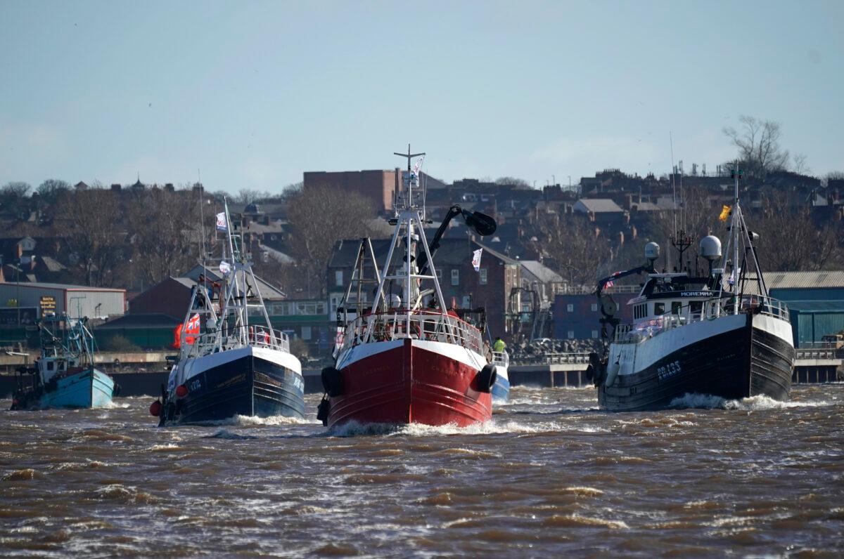 Boats sail the River Tyne during the Fishing For Leave flotilla in North Shields, United Kingdom, on March 15, 2019. (Christopher Furlong/Getty Images)