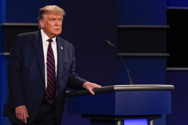 President Donald Trump walks away from the podium at the conclusion of the first presidential debate at Case Western University and Cleveland Clinic, in Cleveland, Ohio, Sept. 29, 2020. (AP Photo/Patrick Semansky)