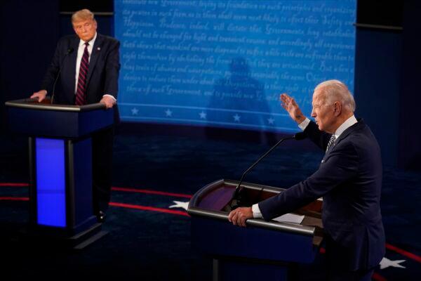 President Donald Trump listens to Democratic presidential candidate former Vice President Joe Biden during the first presidential debate at Case Western Reserve University and Cleveland Clinic in Cleveland, Ohio, on Sept. 29, 2020. (Morry Gash/Pool/AP Photo)