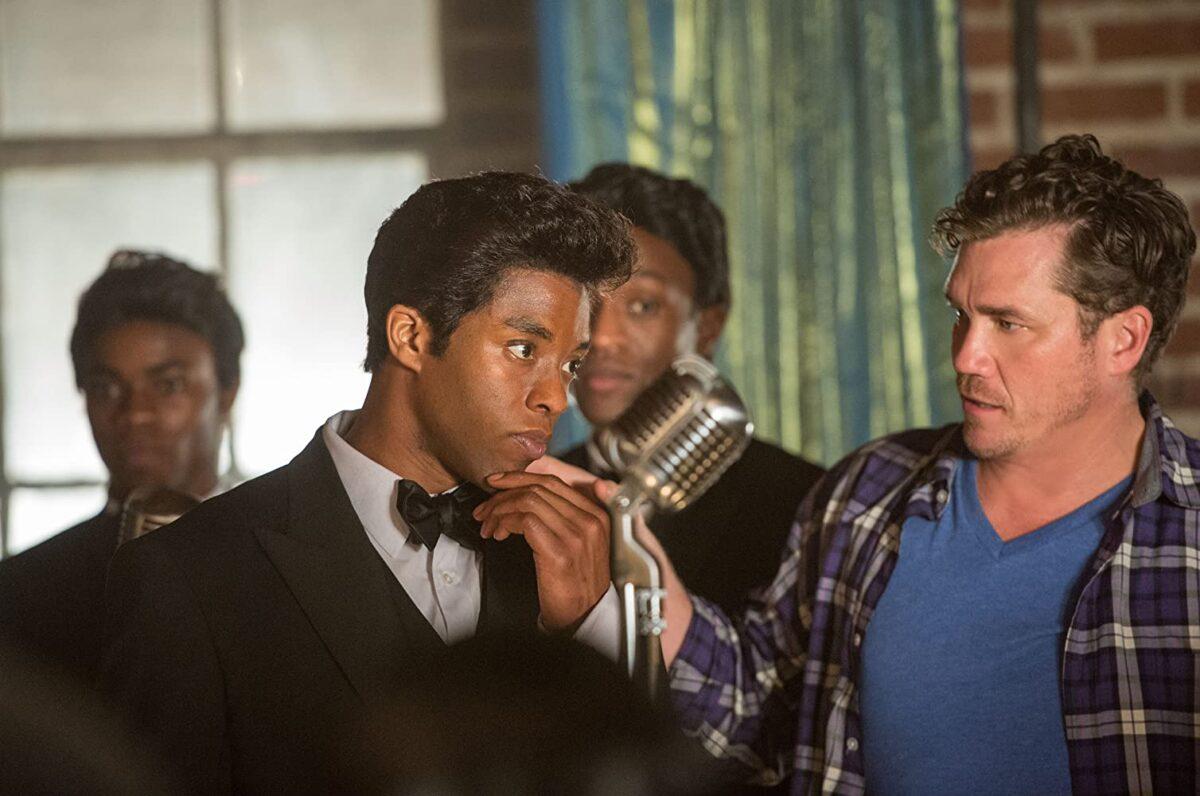 (Foreground) Chadwick Boseman (L) and director Tate Taylor working on “Get on Up.” (D. Stevens/Universal Pictures)