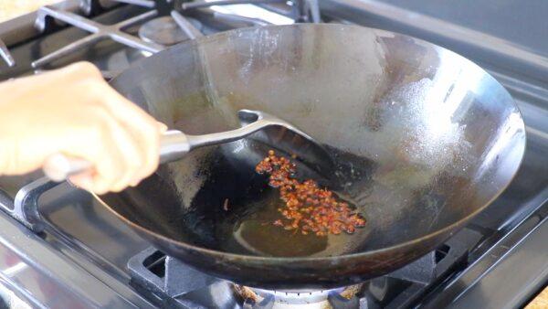 Cook the Sichuan peppercorns. (CiCi Li)