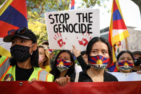 Tibetans, Uyghurs, Kazakhs, Hongkongers, Southern Mongolians, Taiwanese, and Chinese Democracy Activists join together to call on governments to stand against the Chinese Communist Party’s suppression of freedom, democracy, and human rights, in front of the United Nations headquarters in New York City on Oct. 1, 2020. (Samira Bouaou/The Epoch Times)