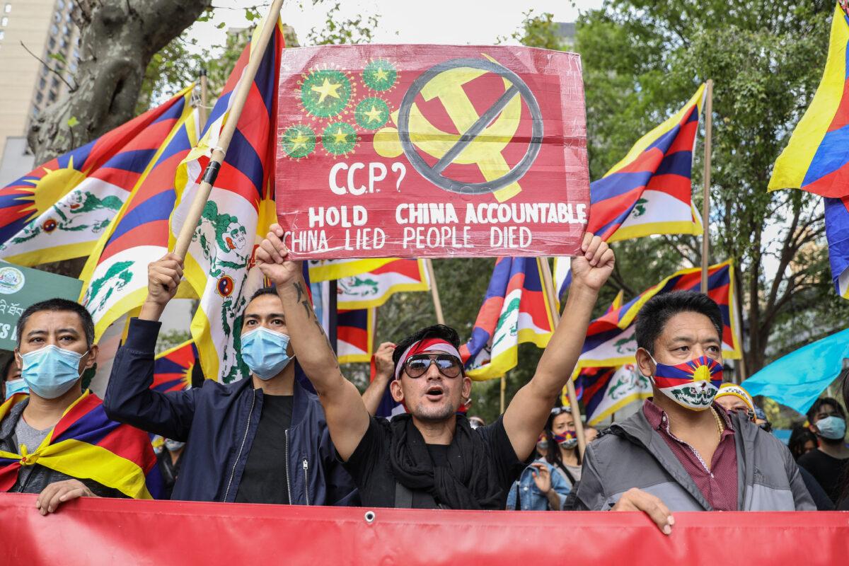 Tibetans, Uyghurs, Kazakhs, Hongkongers, Southern Mongolians, Taiwanese, and Chinese Democracy Activists join together to call on governments to stand against the Chinese Communist Party’s suppression of freedom, democracy, and human rights, in front of the United Nations headquarters in New York City on Oct. 1, 2020. (Samira Bouaou/The Epoch Times)