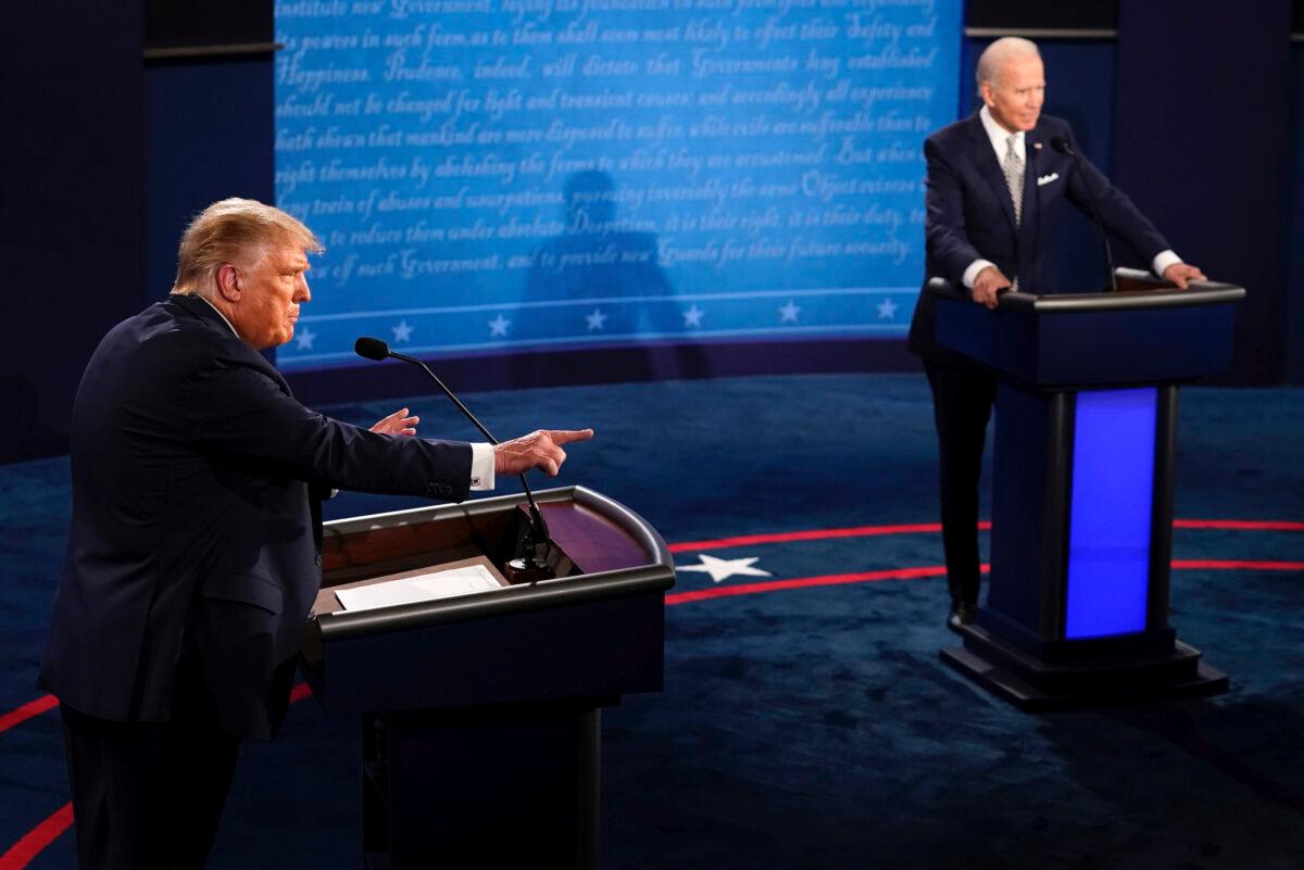 President Donald Trump makes a point as Democratic presidential nominee former Vice President Joe Biden listens during the first presidential debate at Case Western University and Cleveland Clinic, in Cleveland, Ohio, on Sept. 29, 2020. (Morry Gash/Pool/AP Photo)