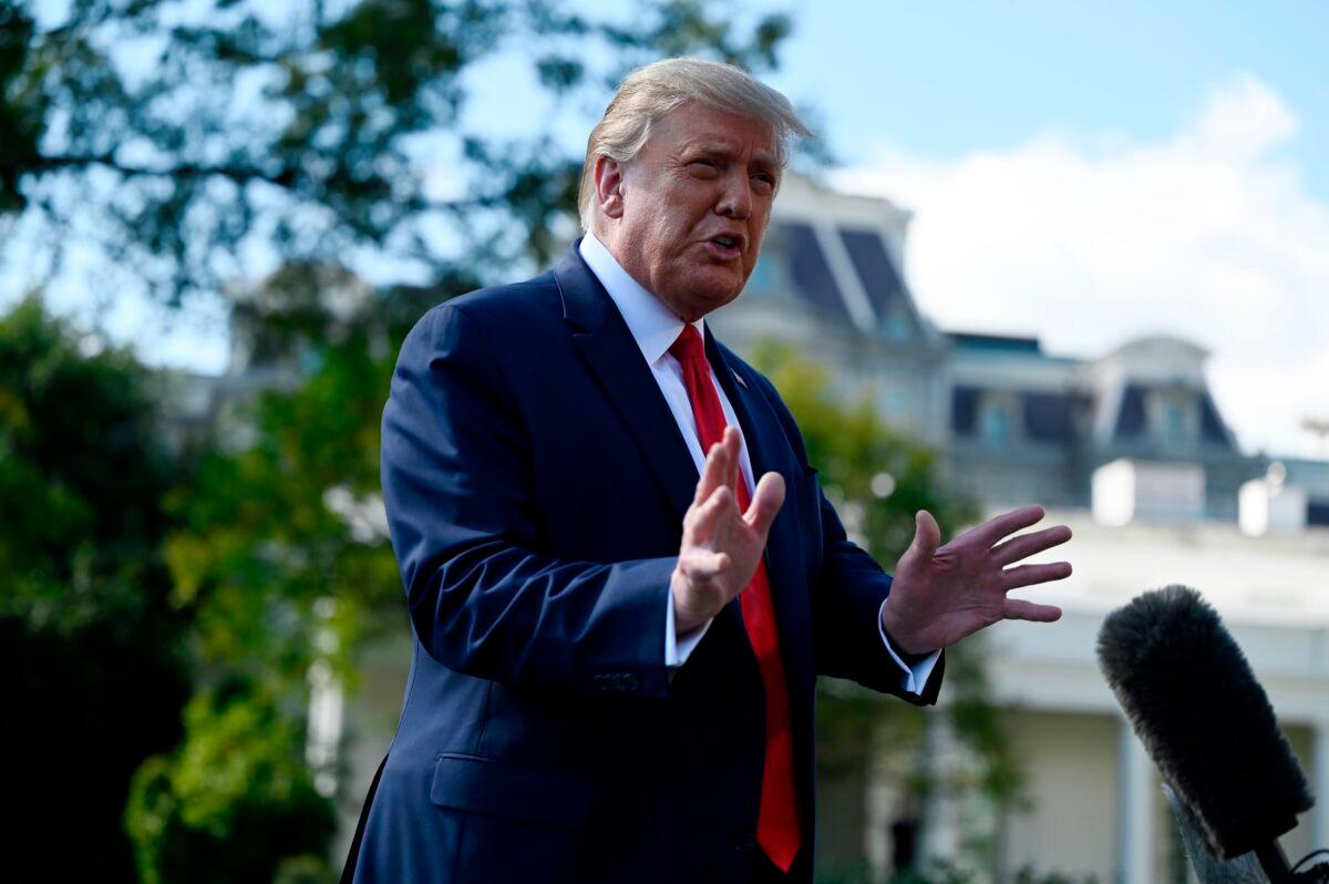 President Donald Trump speaks to the media as he walks to Marine One on the South Lawn of the White House in Washington, on Sept. 30, 2020. (Andrew Caballero-Reynolds/AFP via Getty Images)