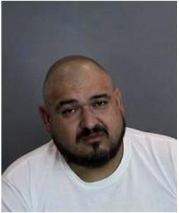 Sergio Hurtado, who was arrested and charged with the murder of his brother Jose, is seen in a police booking photo. (Courtesy of the Anaheim Police Department)